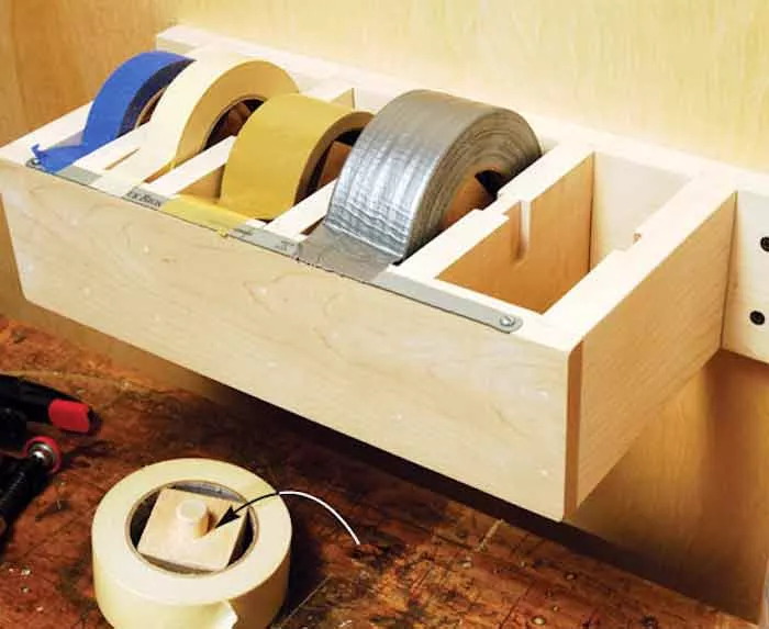 système maison de rangement de rouleaux adhésifs